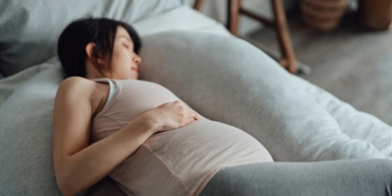 Your body undergoes a lot of changes during pregnancy, leading to back pain, swelling and even carpal tunnel. A pregnancy pillow can make you more comfortable overnight.