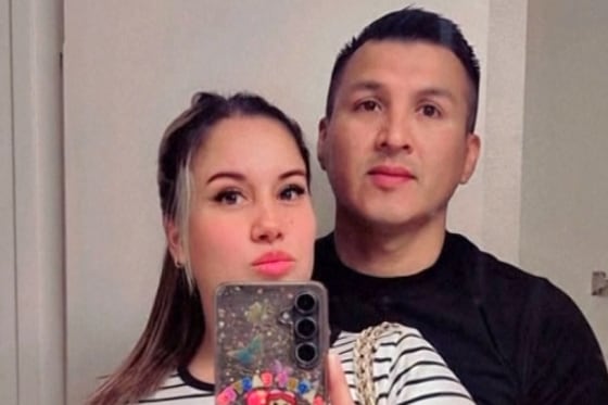 Sheylla Cabrera, left, and Jossimar Cabrera post for a photo