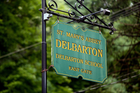 A sign that reads, "St. Mary's Abbey Delbarton School East Gate"