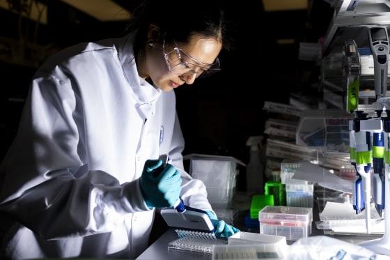 A researcher works in the lab at Moderna headquarters in Cambridge, Mass., last year. The mRNA technology, which Moderna used to develop the Covid vaccine, has a shorter production cycle than whole-killed virus vaccines. 