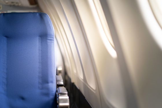 Seats and window in cabin airplane