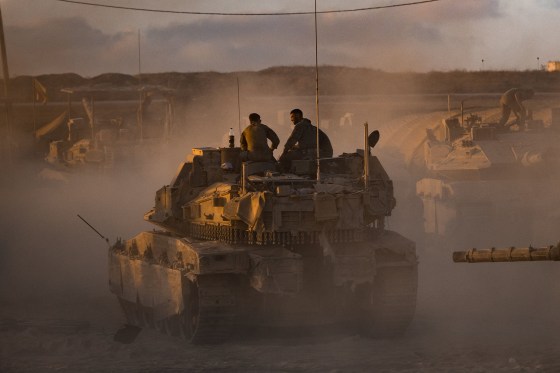 Israeli soldiers prepare tanks on Aug.18, 2025 near the border with the Gaza Strip.
