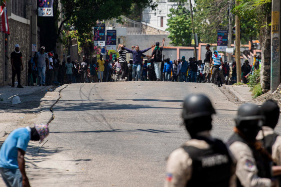 Police confront citizens.