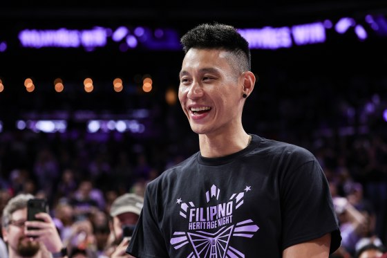 Jeremy Lin smiles on the basketball court
