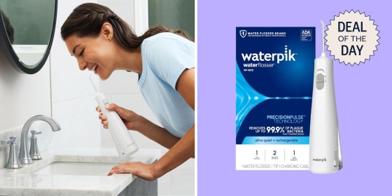 The flosser comes with an angled tip applicator and a short USB-C cable for charging.