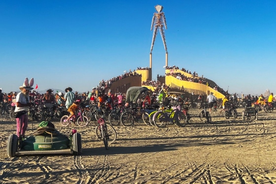 Attendees gather on the Playa at the Burning Man Festival in 2024.