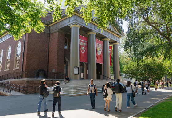 Banners hang from the side of Memorial Church on the first day of classes at Harvard University.