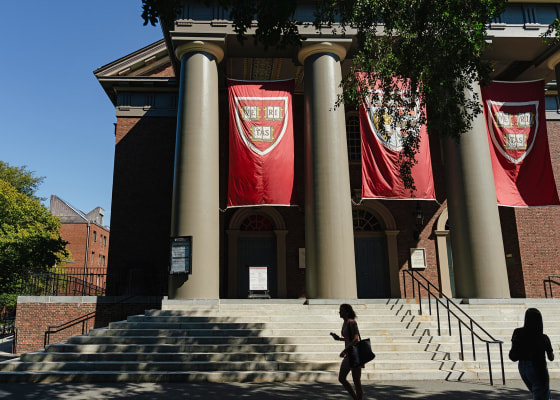 The exterior of Memorial Church as people walk past