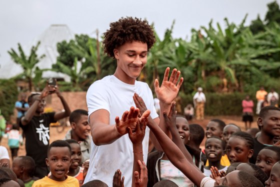 Nate Ament plays at a basketball camp in Rwanda during a trip in August.