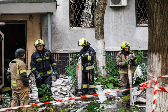 Debris and emergency workers.