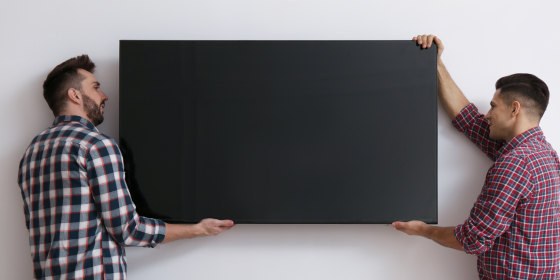 Mounting a TV is best done with at least two people, according to our expert.
