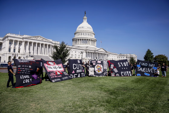 Image: Save HIV Funding Campaign Unveils #CutsKill AIDS Quilt