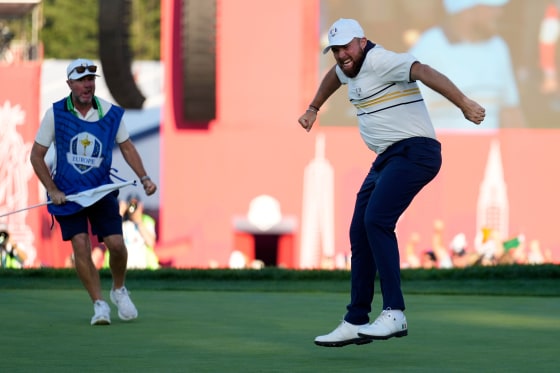 Europe's Shane Lowry celebrates after making the winning putt on the 18th hole during his singles match on the Bethpage Black golf course at the Ryder Cup golf tournament.