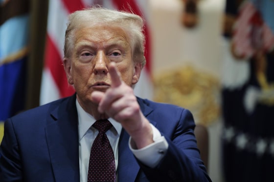 President Donald Trump calls on a reporter during a Cabinet meeting on Aug. 26, 2025.