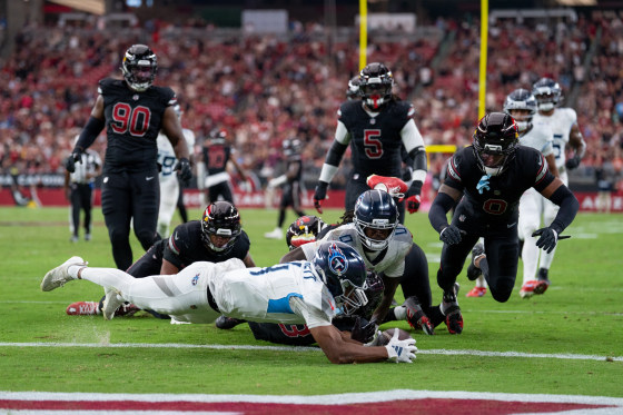 Tennessee Titans receiver Tyler Lockett jumps on a fumble to score a touchdown in the fourth quarter on Oct. 5 during his team's comeback in in Arizona.