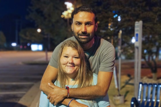 Kapil Raghu and his wife Ashley Mays.