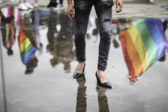 A man in heels marches in the Gay Pride parade in Bogota, Colombia, in 2023.