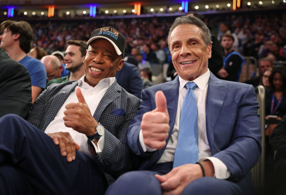 New York Mayor Eric Adams poses with former New York Gov. Andrew Cuomo during a New York Knicks game at Madison Square Garden on Oct. 22, 2025.