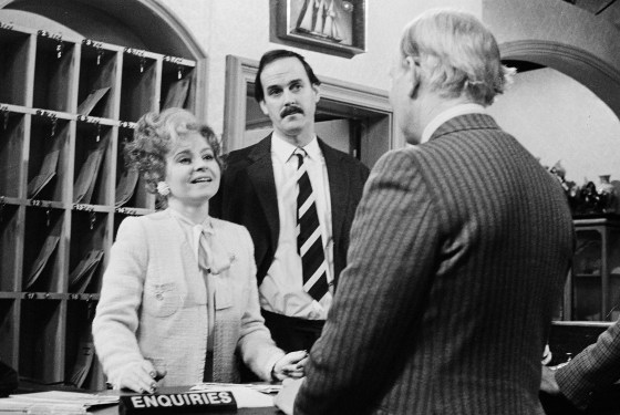 Prunella Scales and John Cleese in a scene "Fawlty Towers."