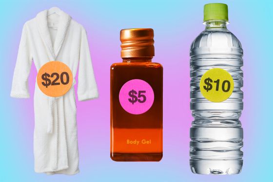 A white robe, body gel bottle, and water bottle with small price tag stickers on them surrounded by a pink glow.