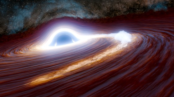 Artist's concept depicts a supermassive black hole in the process of shredding a massive star, at least 30 times the mass of our sun, to pieces.