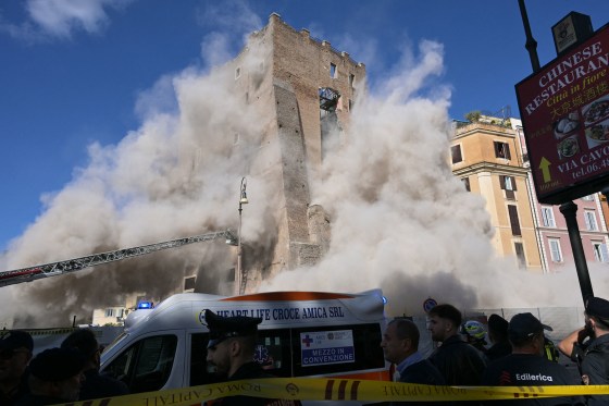 Dust rises due to a second collapse of part of the medieval tower "Torre dei Conti"