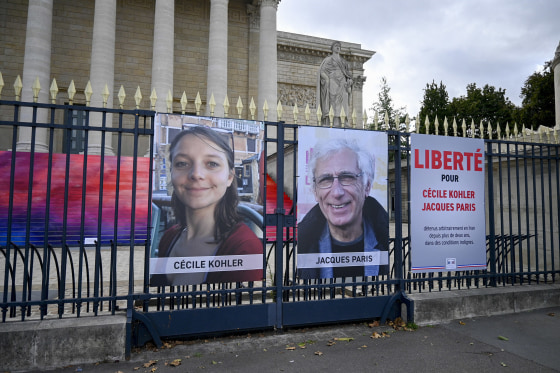 Posters of Jacques Paris and Cecile Kohler on the front of The National Assembly on Sept. 15, 2025 in Paris.