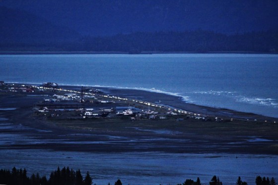 Headlights shine as people evacuate the Spit in Homer, Alaska, following a powerful earthquake in the Aleutian Islands that prompted a tsunami warning on July 22, 2020.