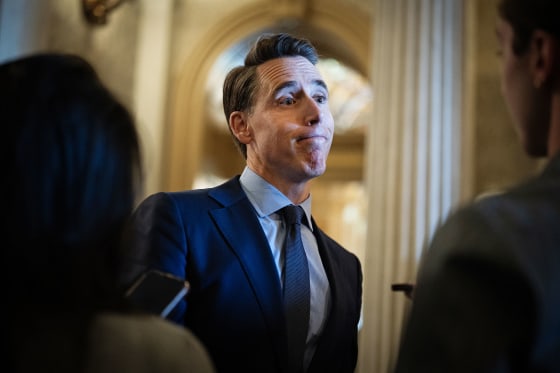 Sen. Josh Hawley talks with reporters at the Capitol