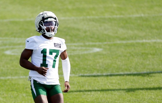 Kris Boyd runs on the football field