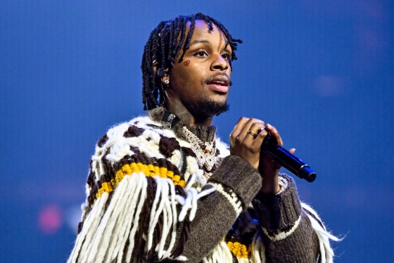 Toosii performs on stage