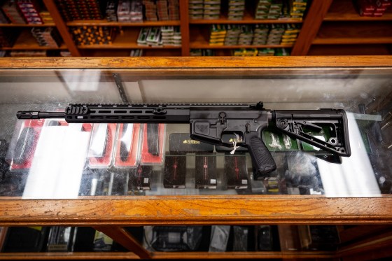 In this photo illustration, a semi-automatic AR-15 is displayed on a countertop at the McBride Guns Inc. store on August 25, 2023 in Austin, Texas. 