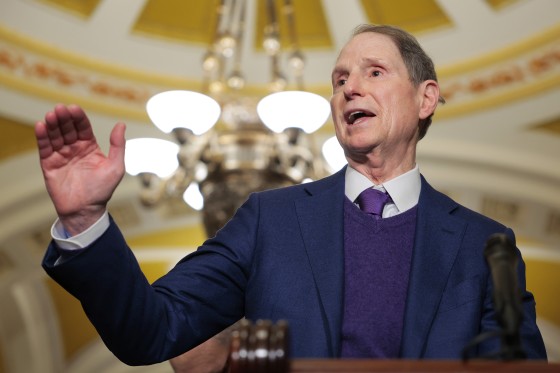 Sen. Ron Wyden, D-Ore., speaks to reporters on December 9 in Washington, DC.