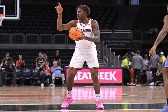 Marcus Allen signals to teammates as the Miami Hurricanes faced the Delaware State Hornets on Nov. 23, 2025.