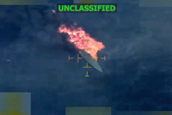 A vessel burns in the Eastern Pacific after it was hit by a U.S. strike on Dec. 12, 2025.