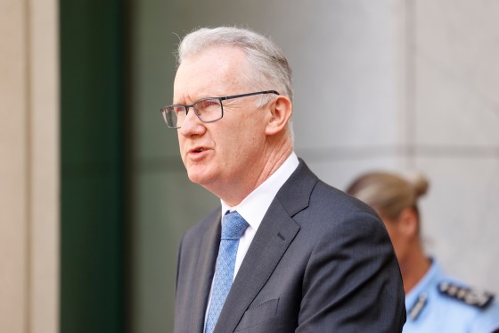 Minister for Home Affairs Tony Burke speaks to the media at Parliament House on Dec. 19, 2025, in Canberra, Australia.