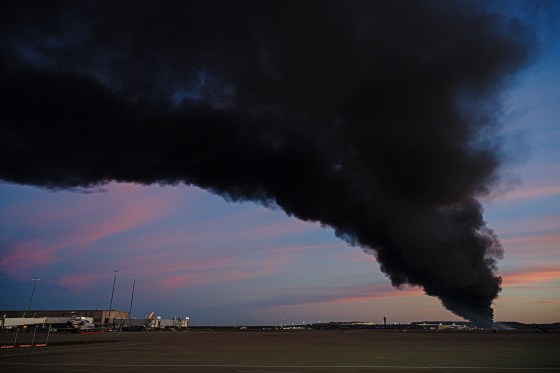 A plume of smoke after the crash of a UPS plane at Louisville International Airport on Nov. 4, 2025.