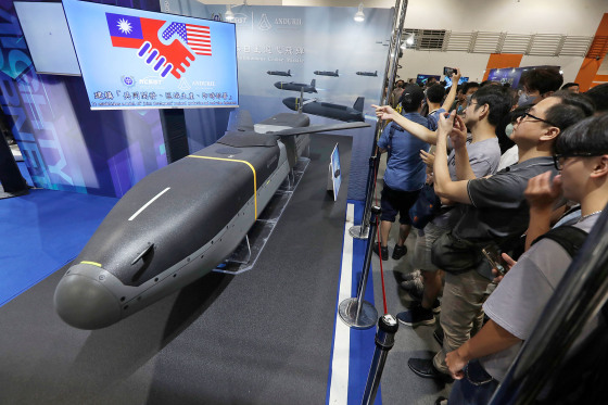 Visitors look at a Barracuda 500, an autonomous cruise missile jointly manufactured by Anduril and Taiwan's National Chung-Shan Institute of Science and Technology, at the Taipei Aerospace & Defense Technology Exhibition