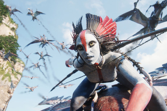 Varang flies on a winged creature in the sky while holding a bow and arrow