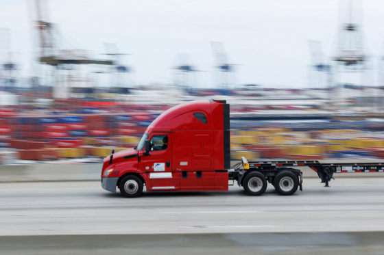 A semi-truck drives at the Port of Los Angeles in Wilmington, Calif., on Nov. 5, 2025. 