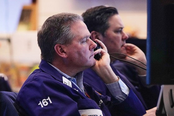Traders work on the floor of the New York Stock Exchange