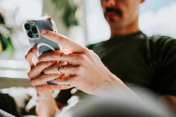 Close-up of a man using a smart phone