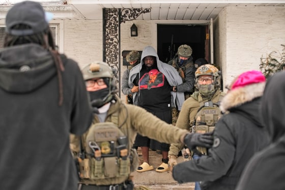 Garrison Gibson is arrested by federal immigration officers Sunday, Jan. 11, 2026, in Minneapolis.