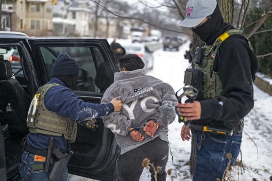A man is detained by a Border Patrol agent on Jan 21, 2026 in Minneapolis.