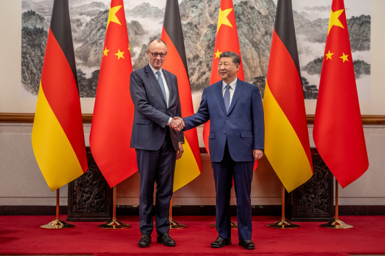 German Chancellor Merz shakes hands with President of China Xi Jinping.