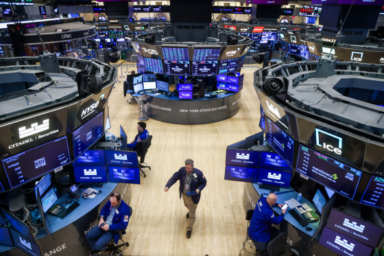 Traders At The New York Stock Exchange as stocks climb on factory data as gold selloff eases