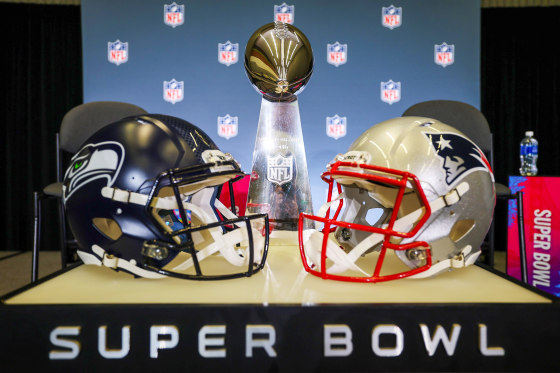 Seattle Seahawks and New England Patriots helmets.