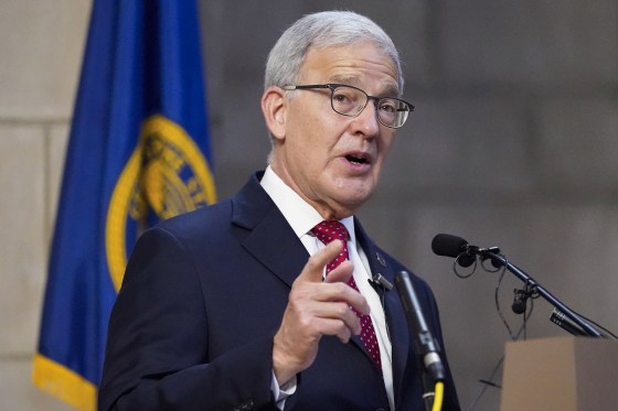Nebraska Secretary of State Bob Evnen speaking from a podium.
