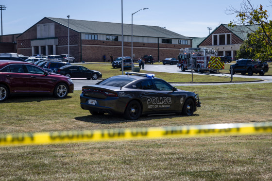 A police car parked at Appalachee High School behind police tape