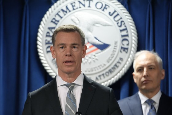 Assistant Director in Charge FBI, Washington Field Office David Sundberg, left, speaks to reporters on March 4, 2024, in Boston. 